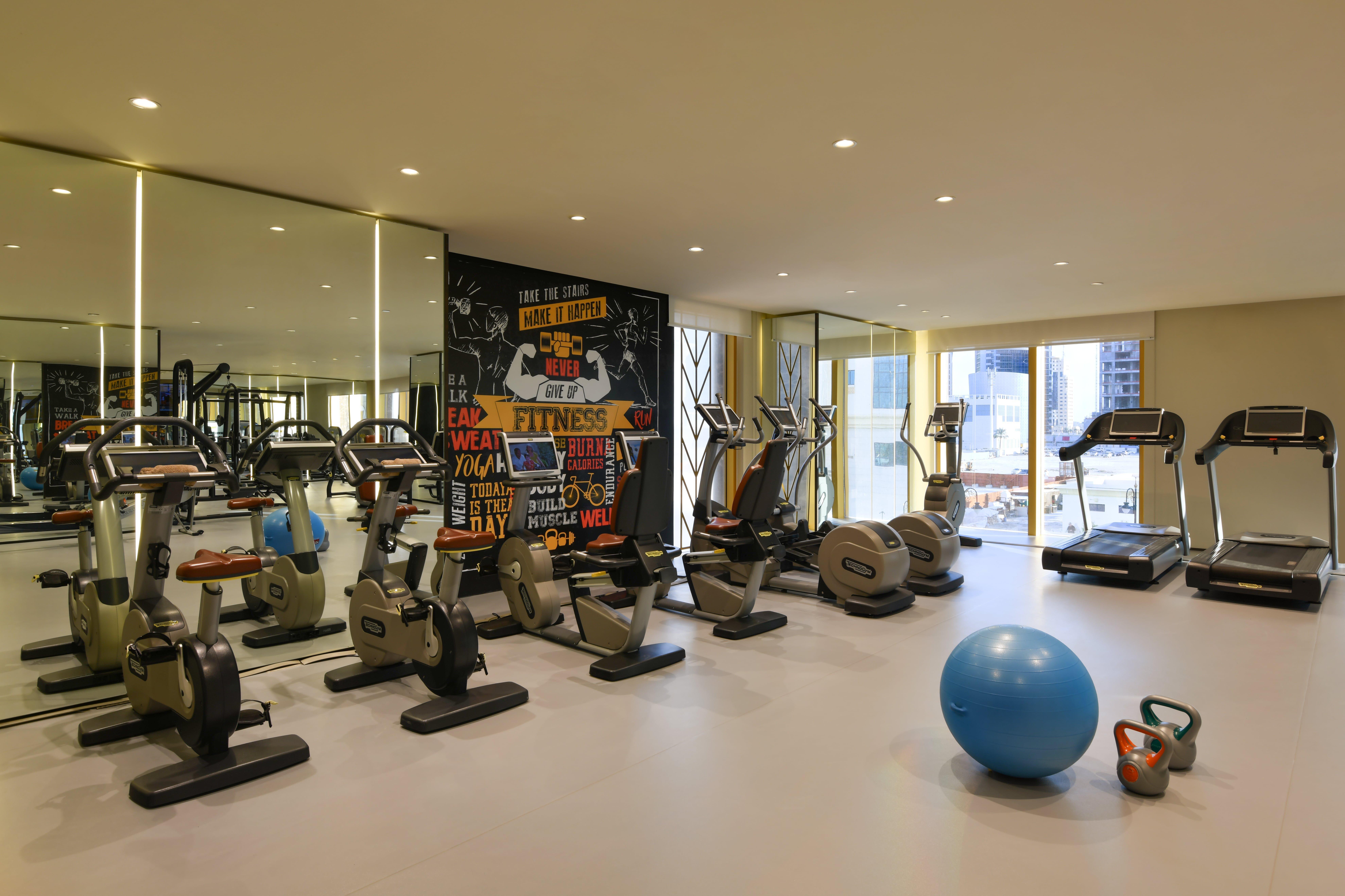 Voco Doha West Bay Suites By Ihg Exterior photo The gym at the hotel