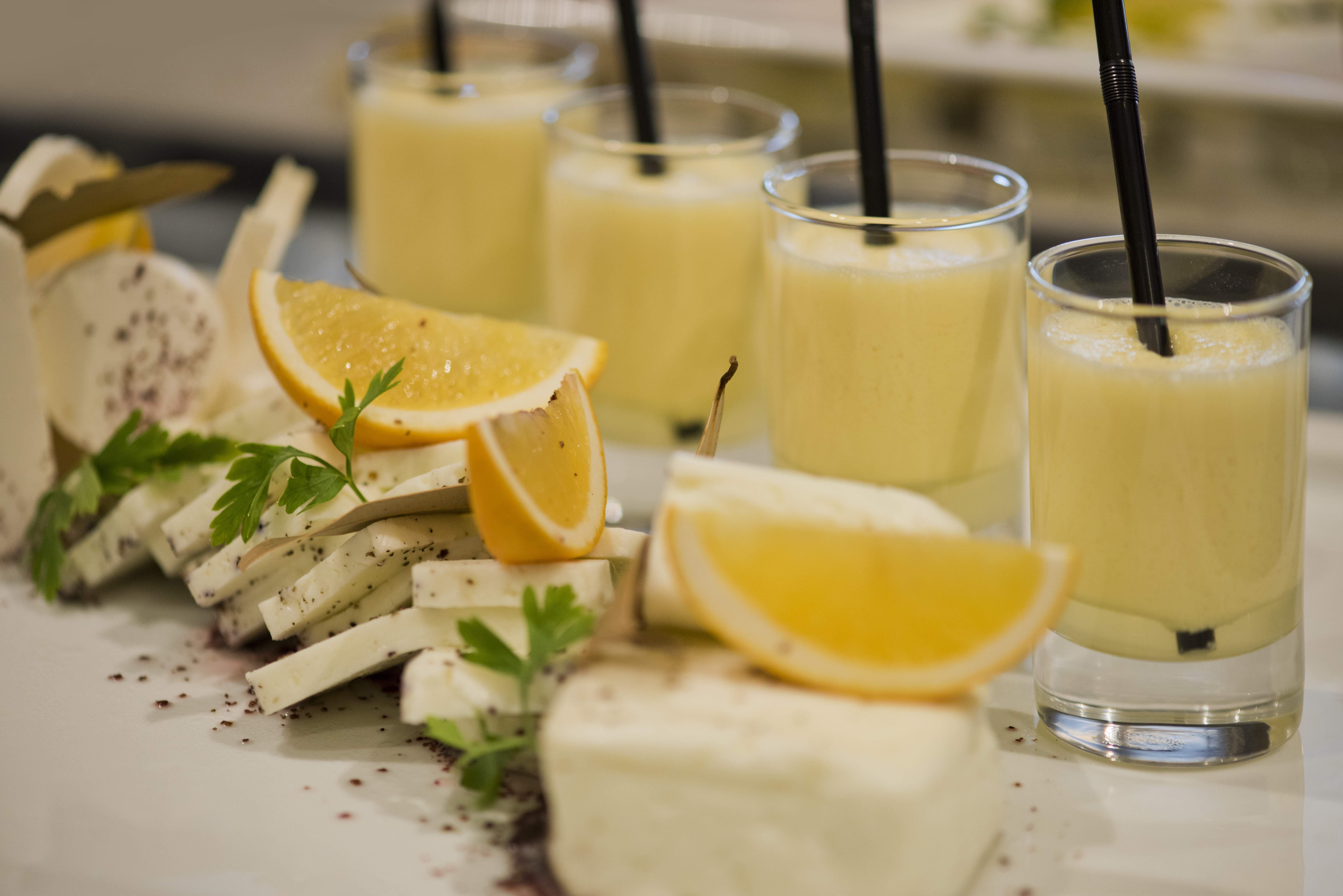 Voco Doha West Bay Suites By Ihg Exterior photo A lemon liqueur
