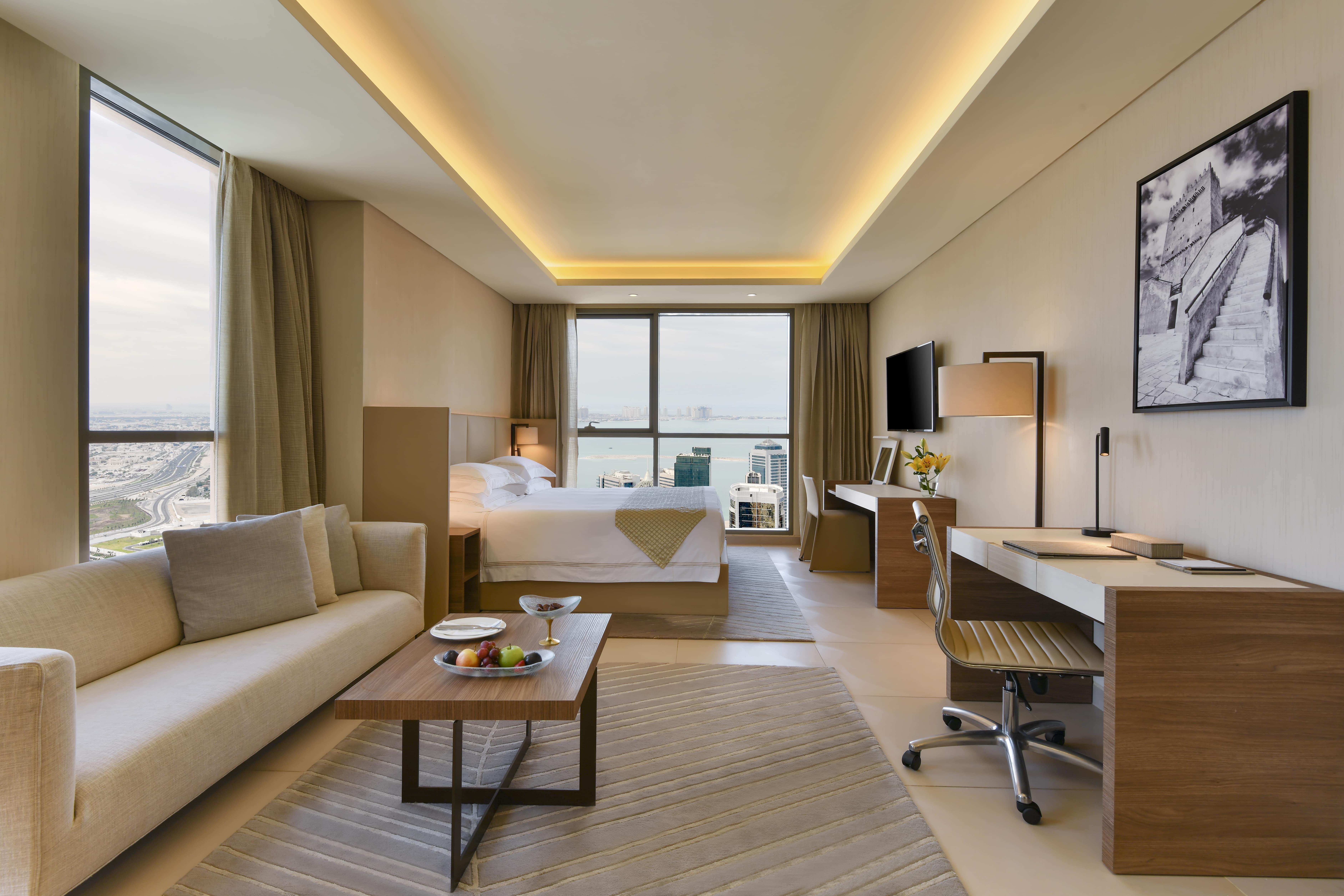 Voco Doha West Bay Suites By Ihg Exterior photo A typical room at the hotel